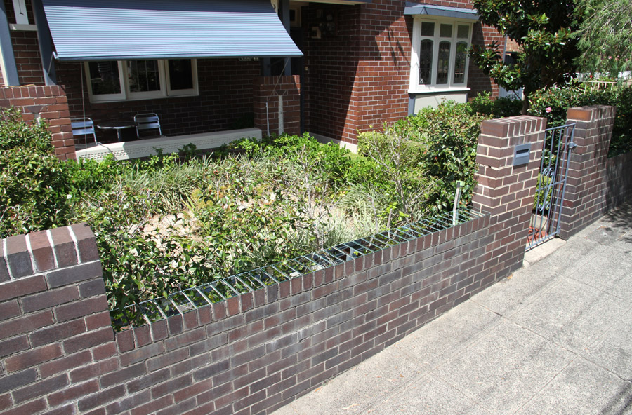 Meredith Frances Lynch: Sky Painting #2013.1 (2013). Glass silver mirror, brick fence line, sky, garden. Approx. 9,000 x 230 x 4mm. 3 Riverdale Ave