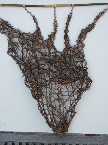 Penny Polkinghorne "What a tangled web", 2013, woven Bangalow palm, bamboo, linen thread and copper, 56 x 55cm