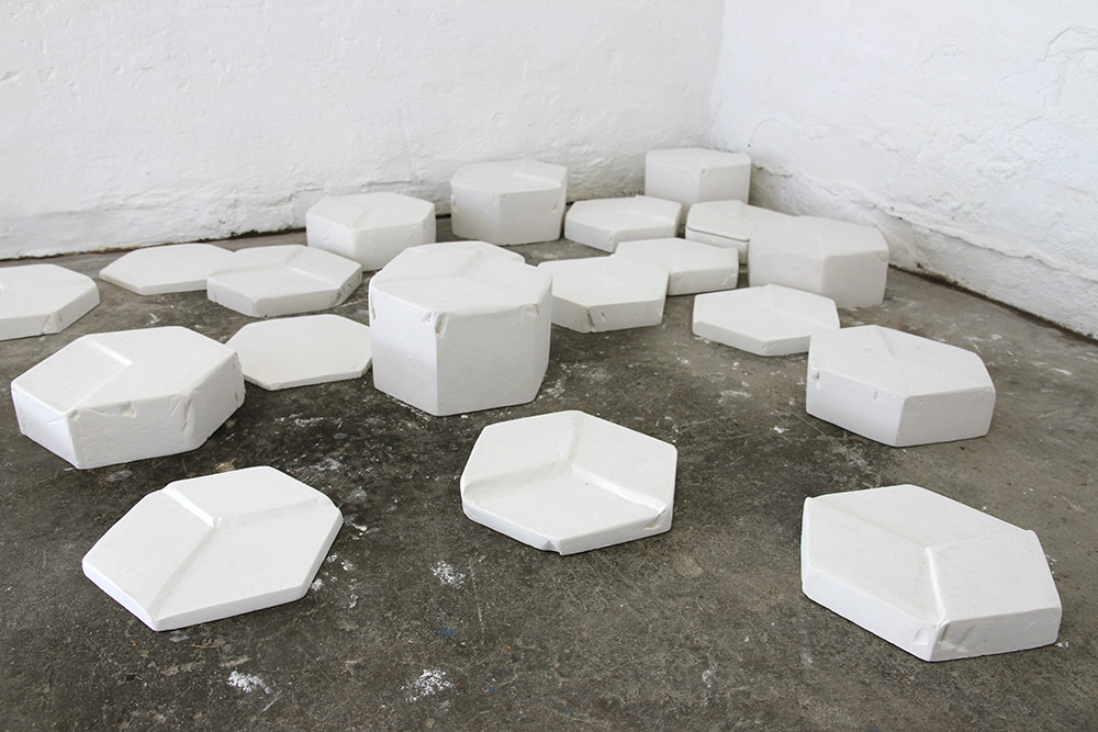 Bridget Minatel: Geo-metric (2013), plaster of paris, dimensions variable.