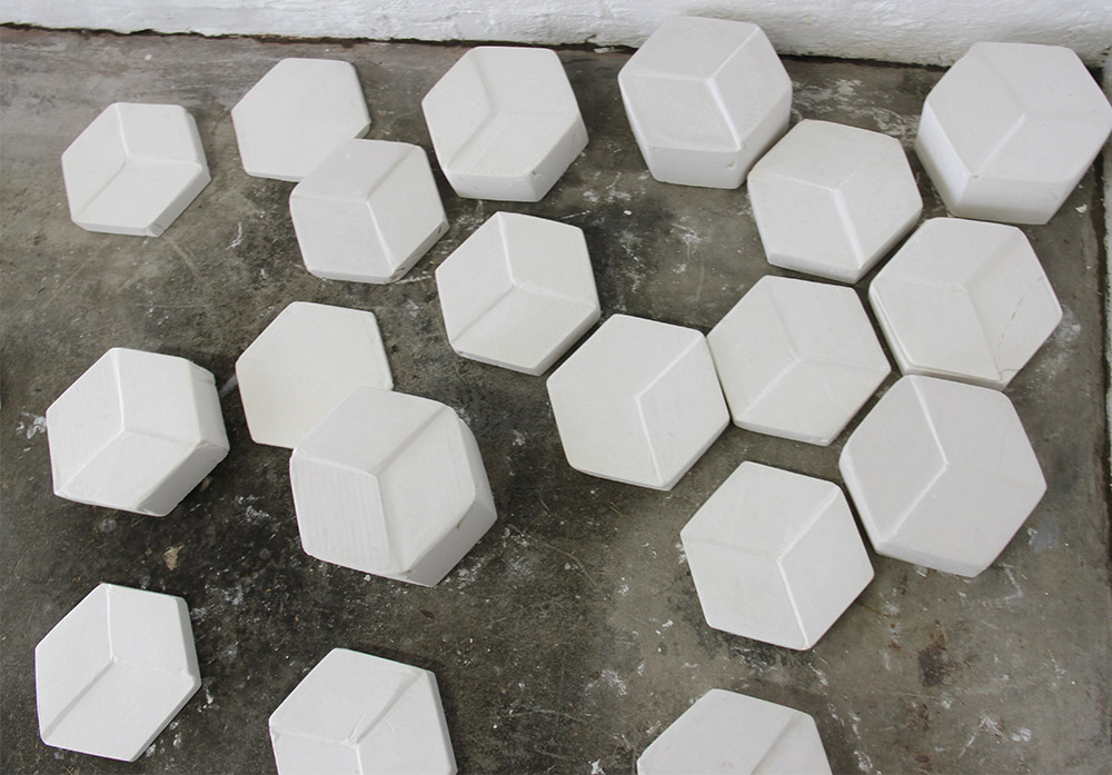 Bridget Minatel: Geo-metric (2013), plaster of paris, dimensions variable.