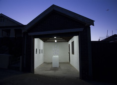 Josie Cavallaro: Spin, 2013. Washing machine, champagne glasses, sound, paper