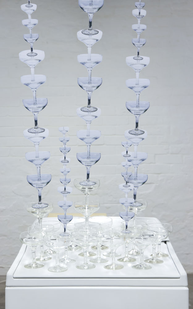 Josie Cavallaro: Spin, 2013. Washing machine, champagne glasses, sound, paper