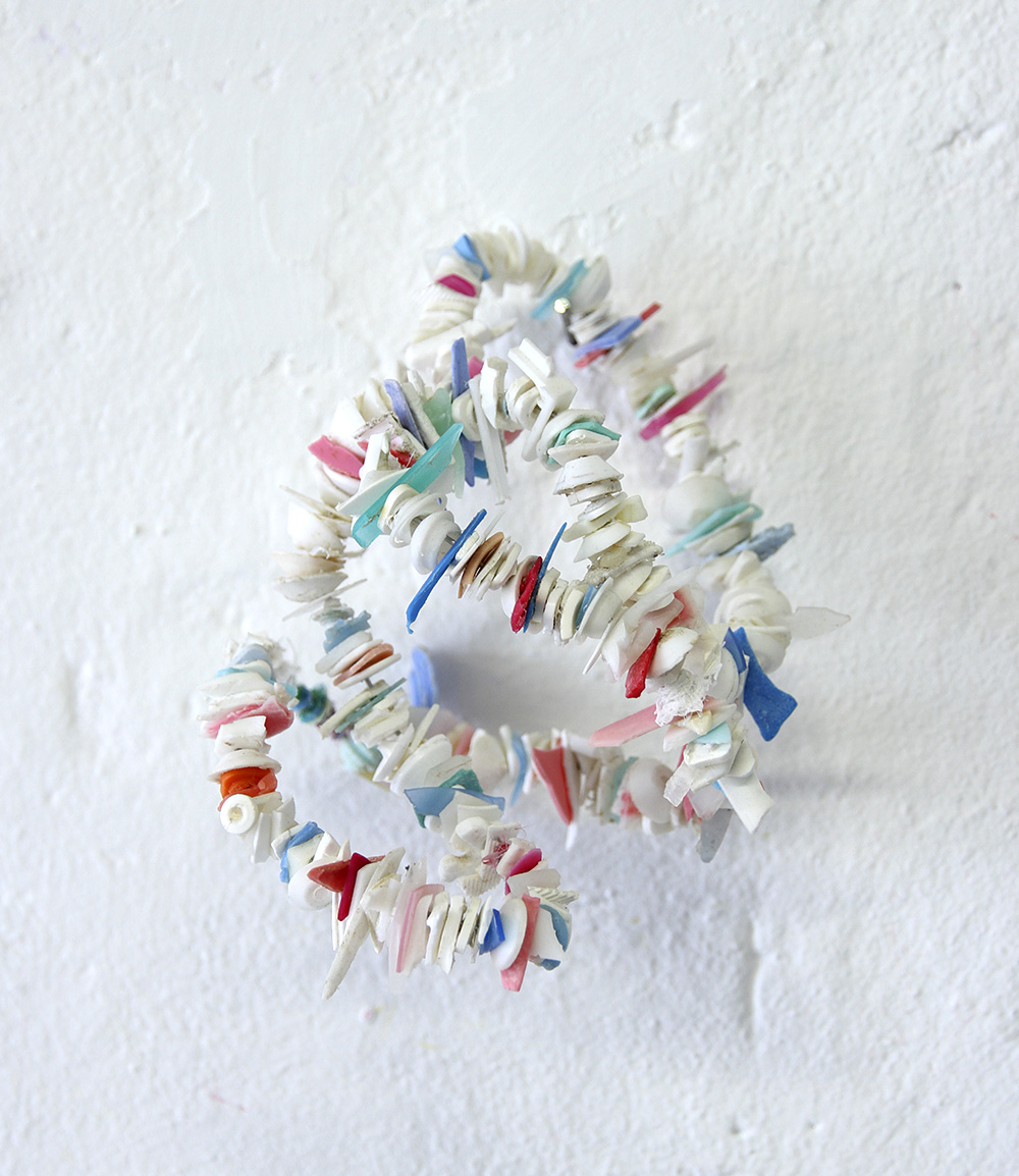 Rox de Luca: Saved Bundles I- V, 2014. found plastics, wire